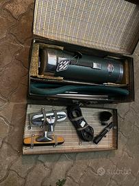 Aspiratore a traino vintage in una valigetta