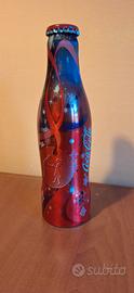 Bottiglia lattina Coca Cola piena e sigillata