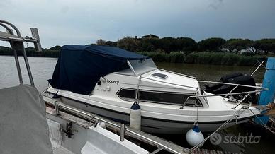 Barca 6 mt cabinata suzuki 140 hp 4T