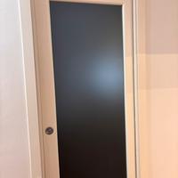 Porta scorrevole a scomparsa