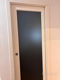 Porta scorrevole a scomparsa