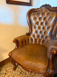 Poltrone bergere in pelle capitonnè