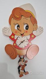 Orologio da muro Pinocchio in legno – decorazione