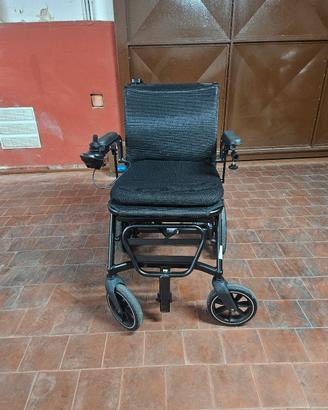 sedia a rotelle elettrica 