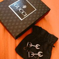 Gemelli Gucci argento.