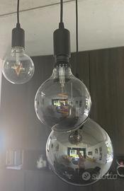 Lampadario da sala con tre sfere lampade in vetro