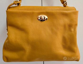 Borsa da donna vera pelle colore senape Firmata.