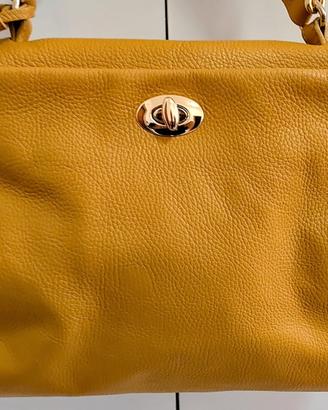 Borsa da donna vera pelle colore senape Firmata.