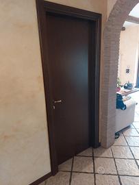 Porta in noce con telai e mostre 4 porte  usate