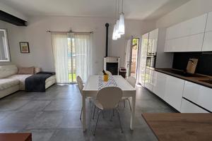 Appartamento con giardino e posto auto