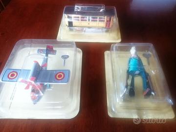 Giocattoli in latta a molla