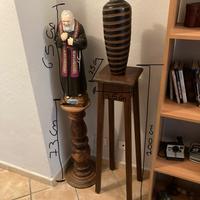 Statua di padre pio e vaso