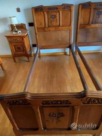 Letti antichi in legno intarsiato