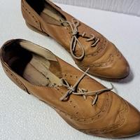 Scarpe in vera pelle con suola in cuoio