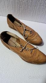 Scarpe in vera pelle con suola in cuoio