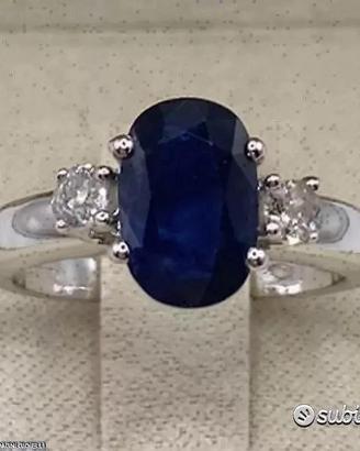 ANELLO ORO 18kt. CON DIAMANTI E ZAFFIRO BLU OVALE