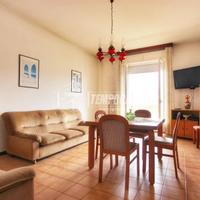 AMPIO TRILOCALE CON POSTO AUTO