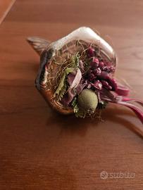 Decorazione laminata in argento