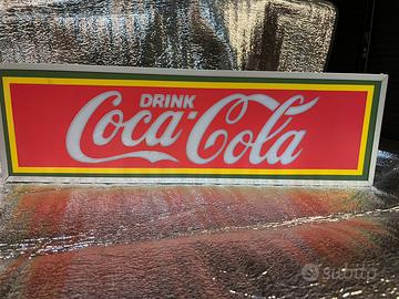 Insegna luminosa Coca-Cola