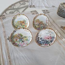 Set miniature porcellane con piattini e vasetti