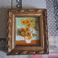 quadrino con cornice antica, vaso con girasoli 