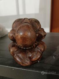 Statuetta  raffigurante il Buddha piangente