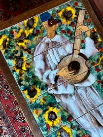 Tavolino con ceramiche colorate