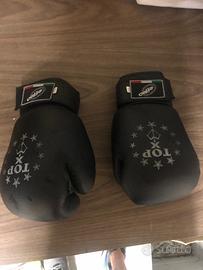 Guanti kick boxing, più' protezioni