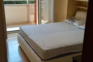 Libera camera singola con balcone e condizionatore