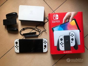 Nintendo switch OLED con giochi e accessori