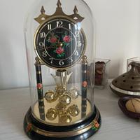 Orologiomovimento al quarzo con campana di vetro