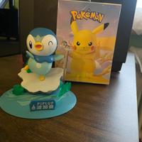 Figure Pokémon PIPLUP su ghiaccio con bolle