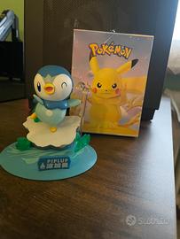 Figure Pokémon PIPLUP su ghiaccio con bolle