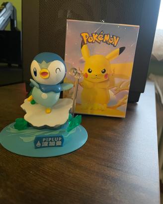Figure Pokémon PIPLUP su ghiaccio con bolle