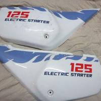 Aprilia Tuareg 125 fiancatine laterali 1987