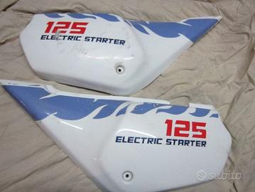 Aprilia Tuareg 125 fiancatine laterali 1987