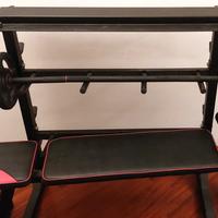 Panca multifunzione con bilanciere e pesi