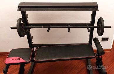 Panca multifunzione con bilanciere e pesi