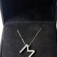 COLLANA LETTERA ORO 18kt. CON DIAMANTI NATURALI