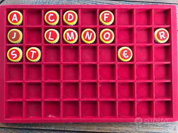 Lotto 13 tappi corona serie alfanumerica succhi