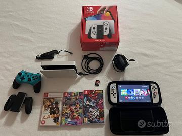 Bundle Nintendo switch OLED + accessori e giochi