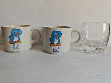 Due tazze colazione e bicchiere da cocktail