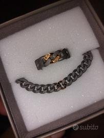 anello e bracciale titanio, oro e diamanti neri 