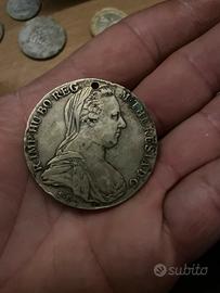 Moneta fatta ciondolo