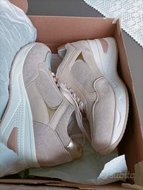 sneakers da donna rialzata n°39  veste piccolo