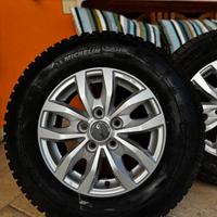4 cerchi in lega + gomme climate