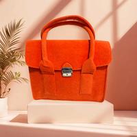 Borsa arancione in tessuto, effetto panno