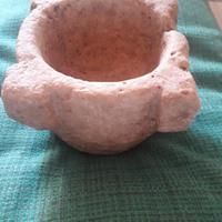 Antico mortaio in pietra