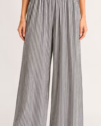 Pantaloni modello palazzo a righe verticali 