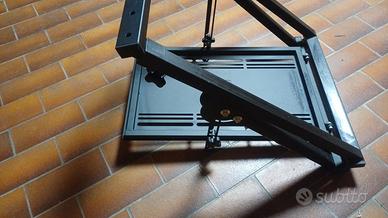 consol videogiochi con volante e comandi